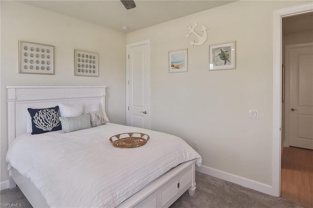 19375 Elston Way Estero, FL 33928 - Photo 14 of 50 a bedroom with a bed and a window