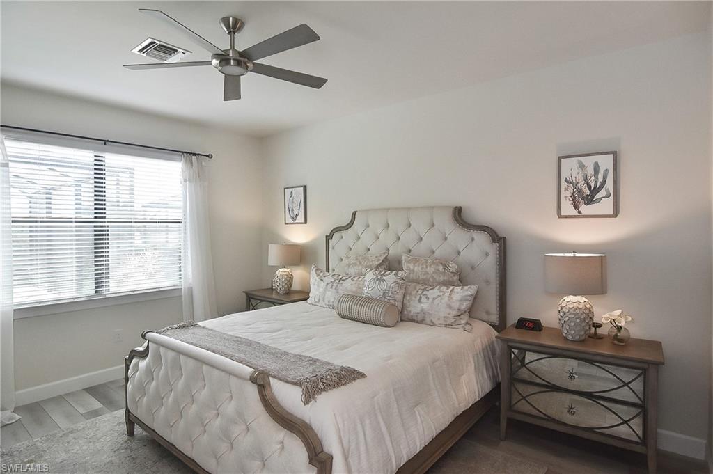 19375 Elston Way Estero, FL 33928 - Photo 18 of 50 a bedroom with a bed and a window
