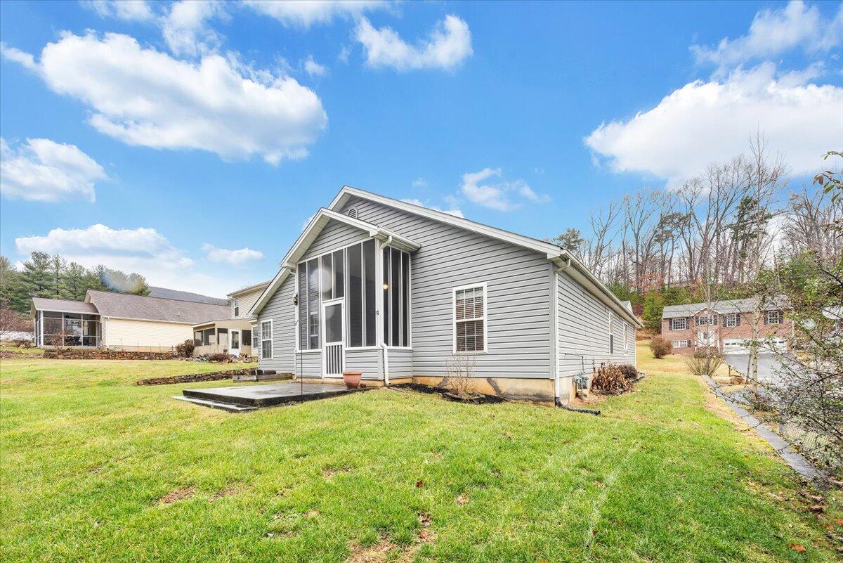 4202 Daugherty Road Salem, VA 24153 - Photo 35 of 38 a view of a house with backyard and sitting area