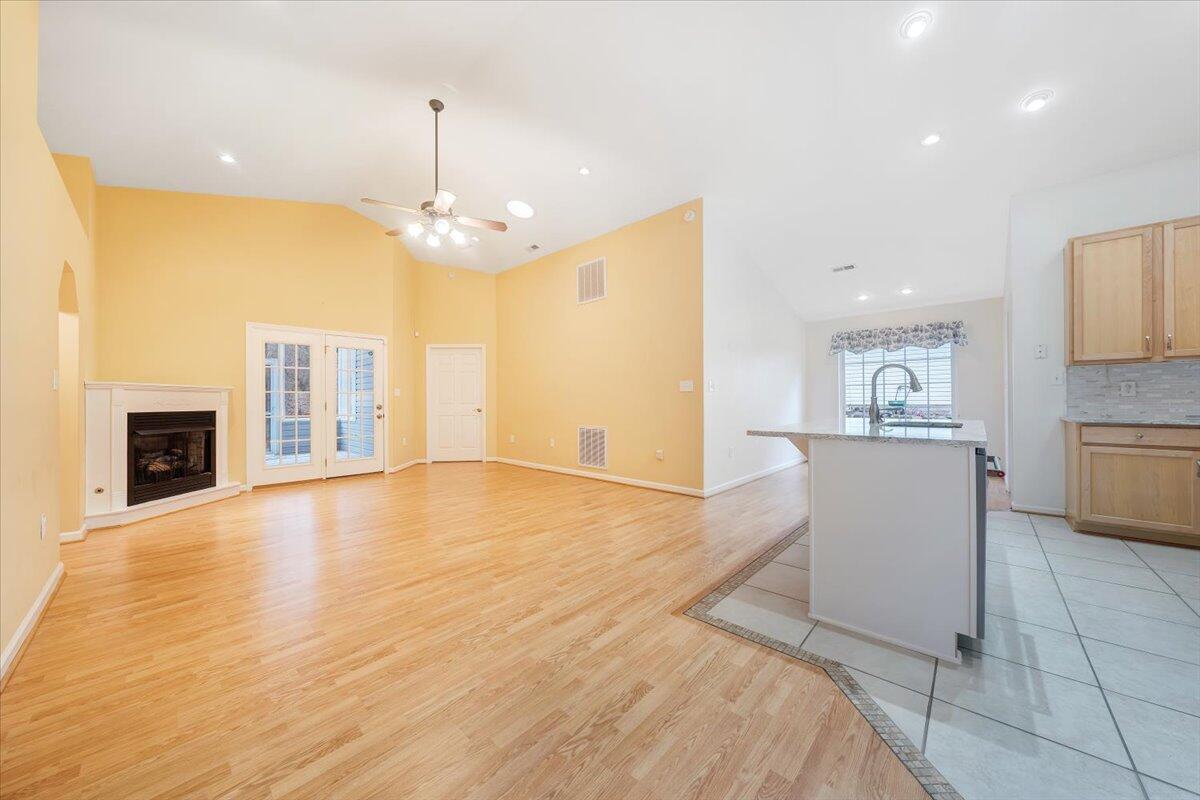 4202 Daugherty Road Salem, VA 24153 - Photo 6 of 38 a view of an empty room with kitchen and a window