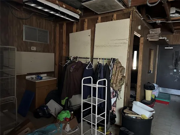 a bathroom with a toilet and a window