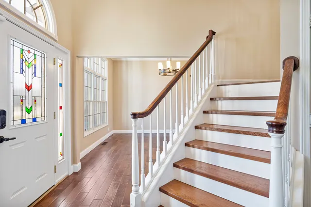 a bathroom with a sink a mirror and a toilet
