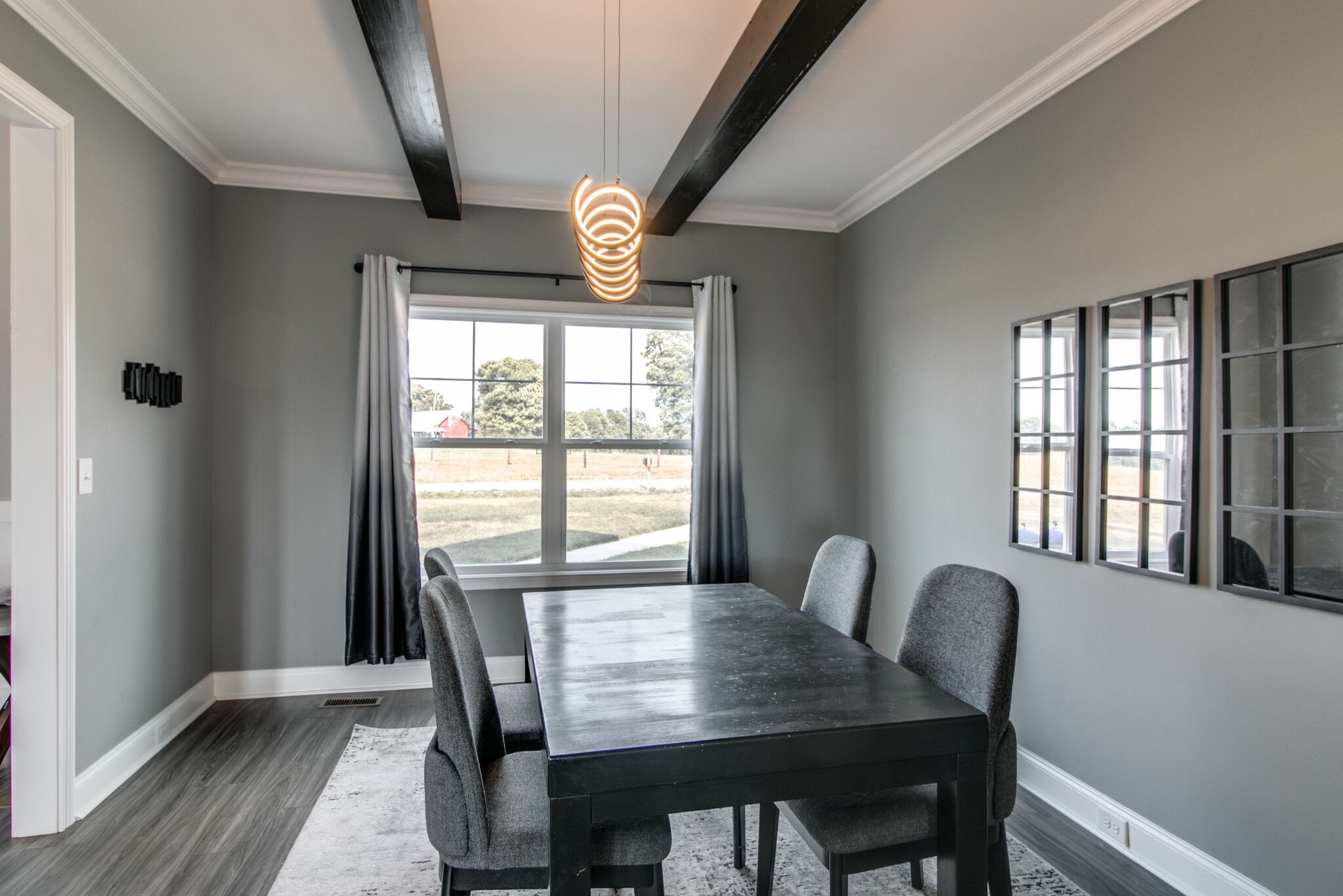1940 Hickory Point Road Clarksville, TN 37043 - Photo 17 of 48 a view of a dining room with furniture window and wooden floor