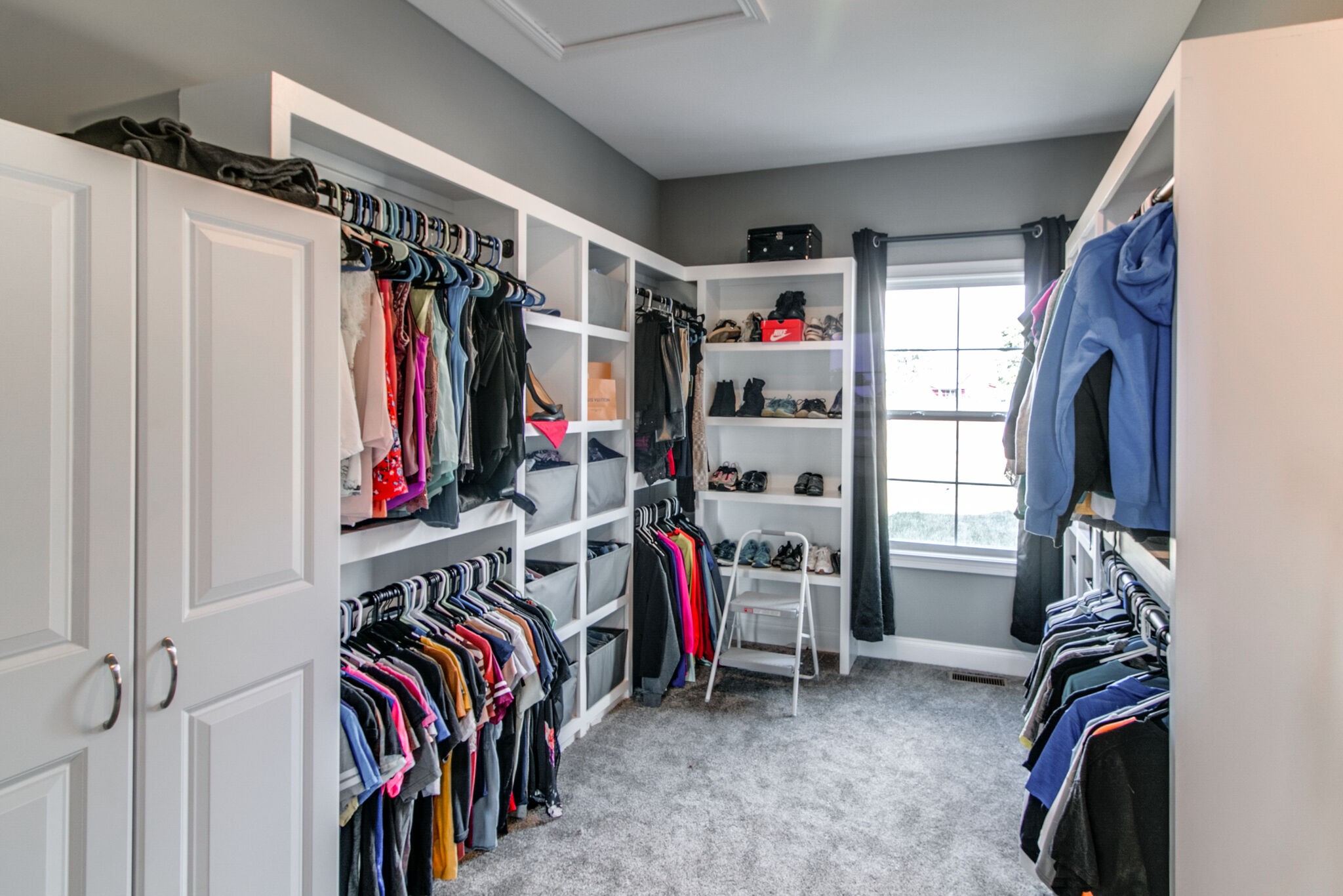 1940 Hickory Point Road Clarksville, TN 37043 - Photo 24 of 48 a view of walk in closet with clothes