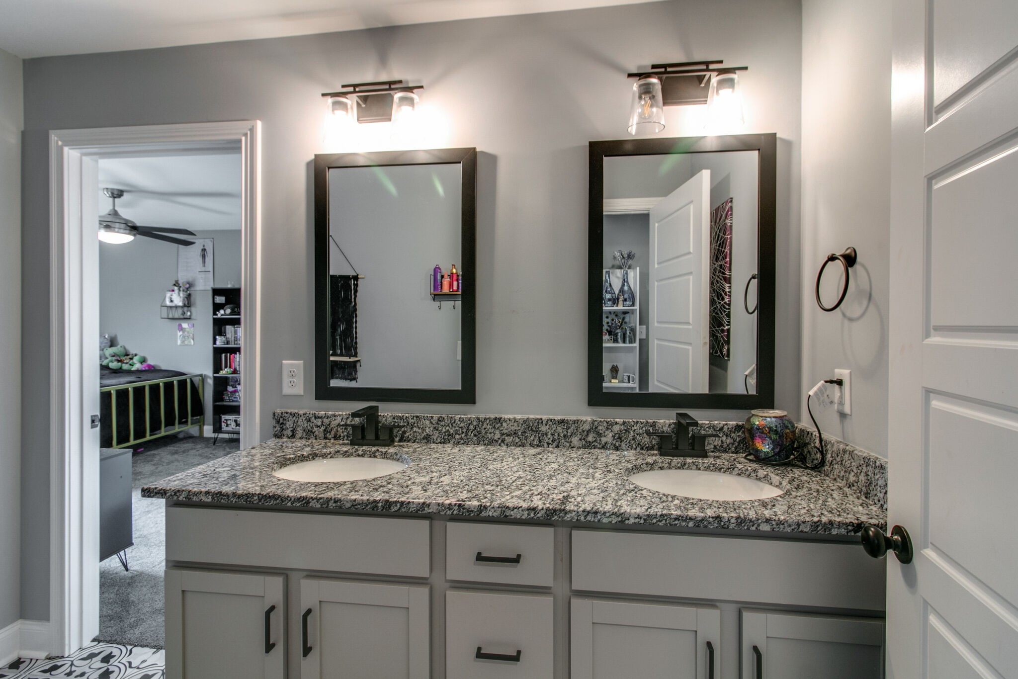 1940 Hickory Point Road Clarksville, TN 37043 - Photo 30 of 48 a bathroom with a granite countertop sink and a mirror