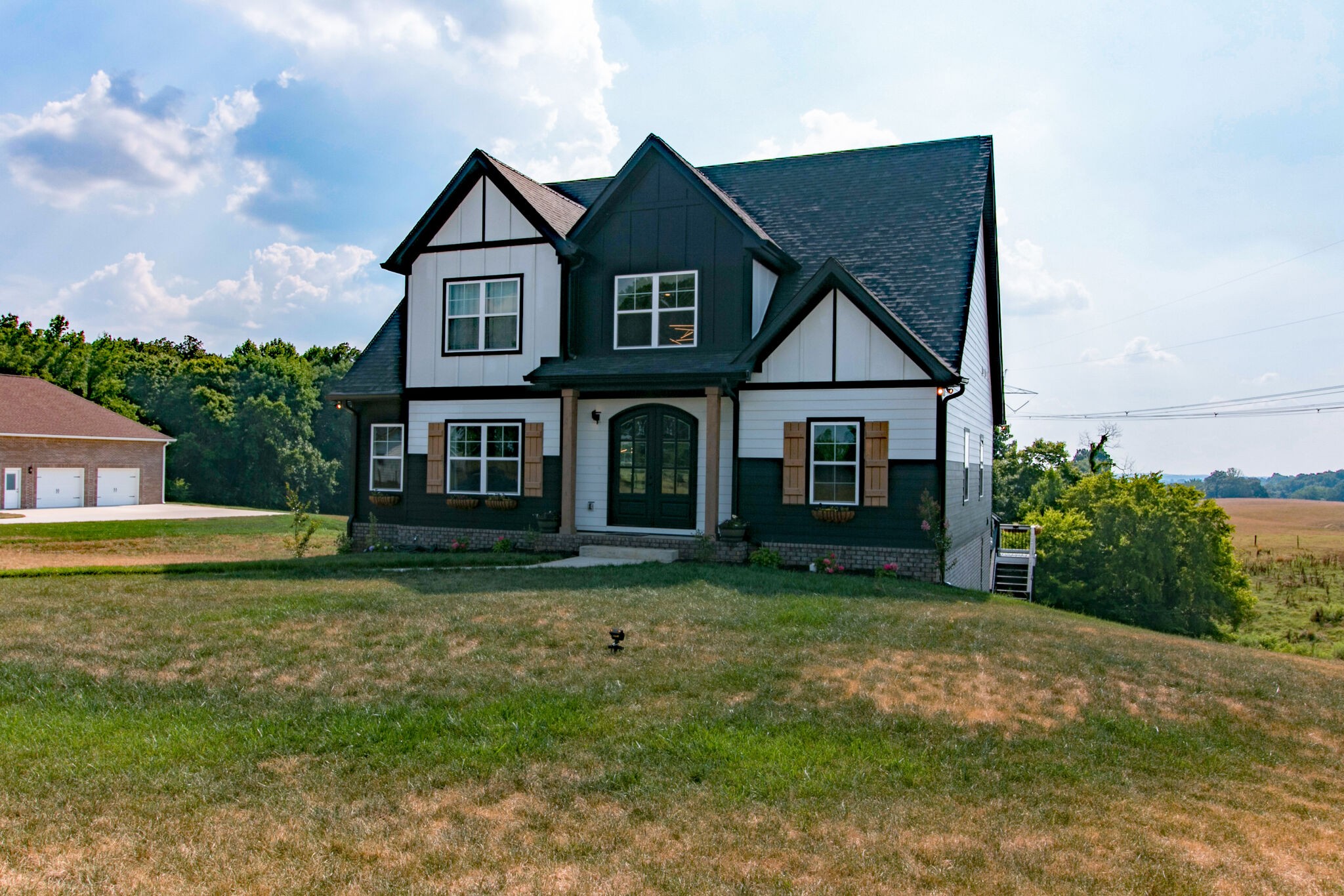 1940 Hickory Point Road Clarksville, TN 37043 - Photo 3 of 48 a front view of a house with a yard