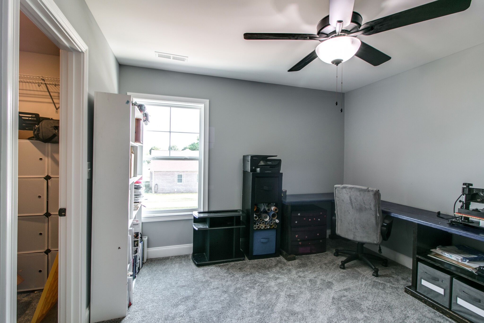 1940 Hickory Point Road Clarksville, TN 37043 - Photo 35 of 48 a room with a bed and a chandelier