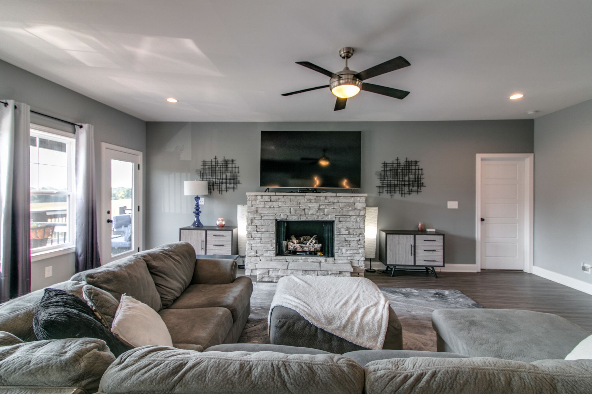 1940 Hickory Point Road Clarksville, TN 37043 - Photo 9 of 48 a living room with furniture and a fireplace