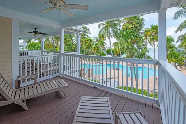 a view of balcony with wooden floor