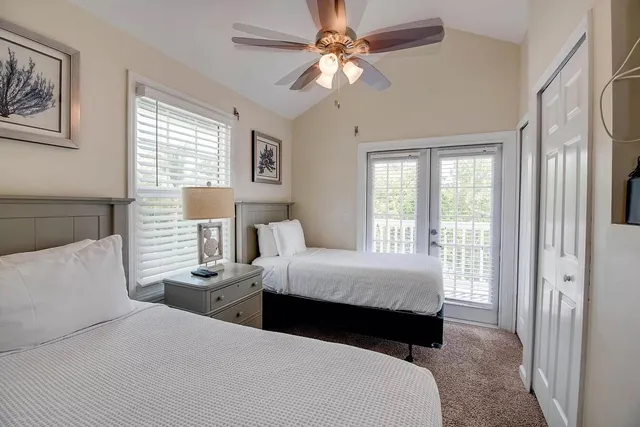 a bedroom with bed and window