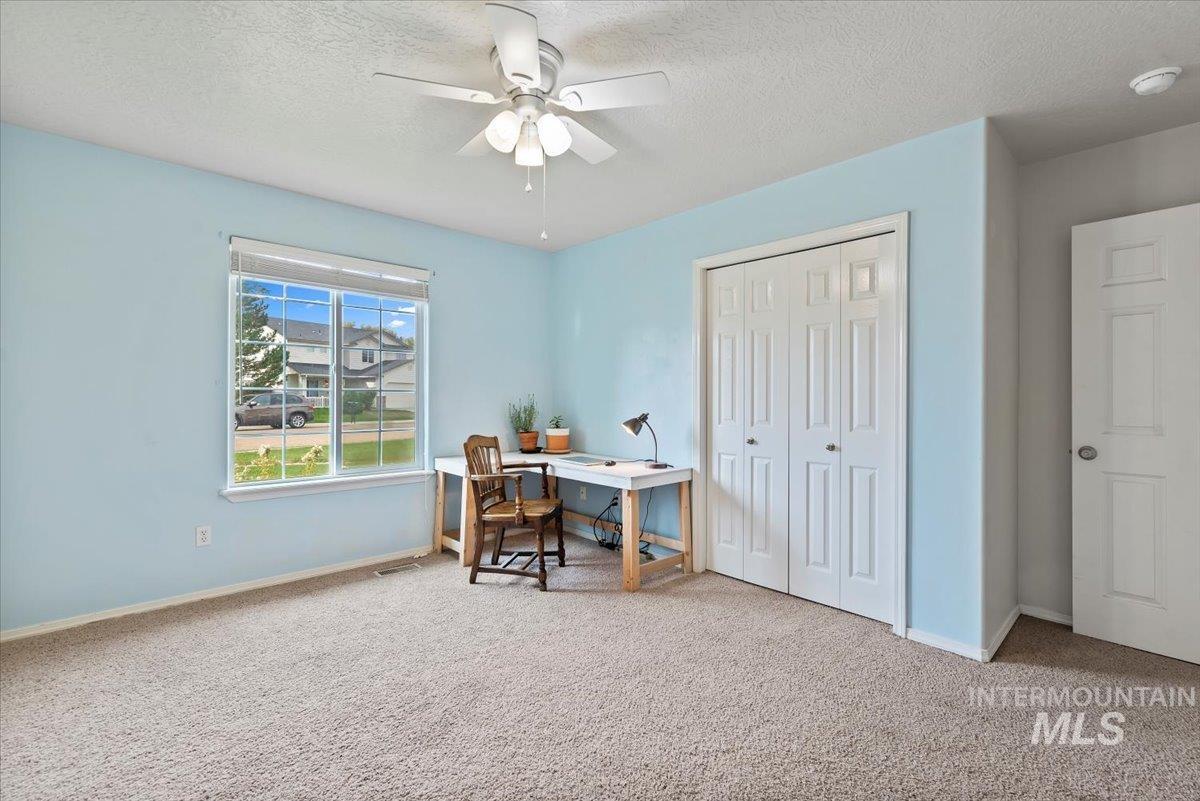 16608 Old Friendship Way Caldwell, ID 83607 - Photo 18 of 32 Carpeted office space featuring a textured ceiling and ceiling fan
