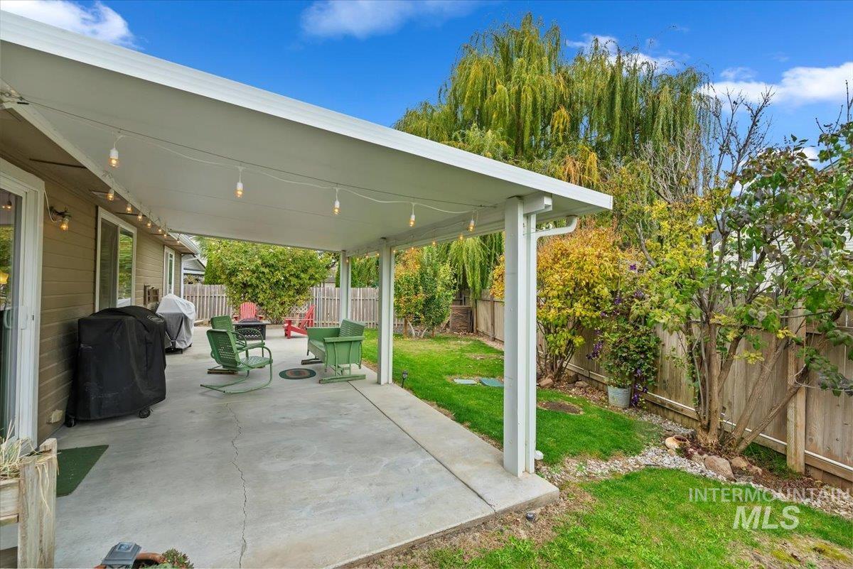 16608 Old Friendship Way Caldwell, ID 83607 - Photo 24 of 32 Fenced backyard with a patio area and grilling area