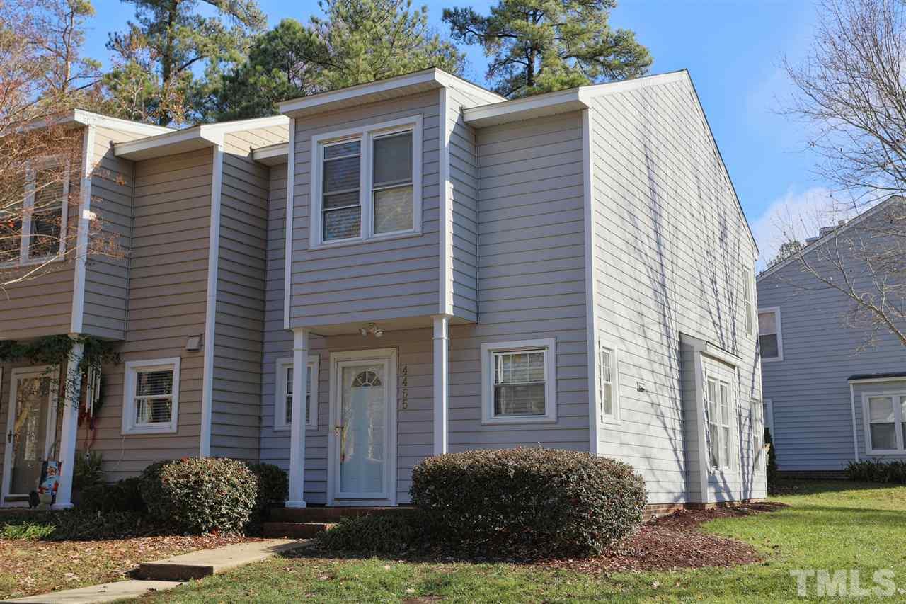 4465 Roller Court Raleigh, NC 27604 - Photo 1 of 23 a view of a house with a yard