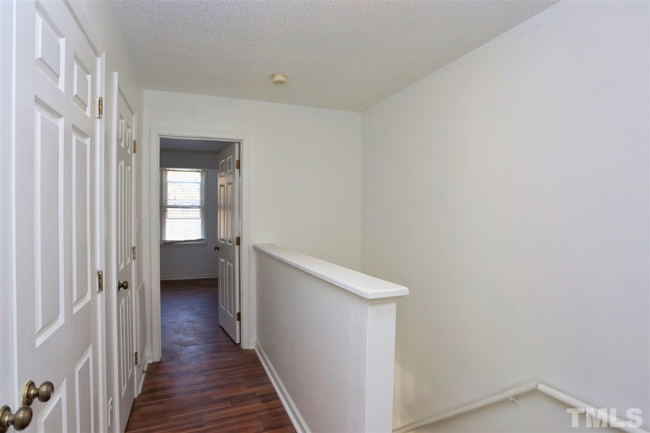 4465 Roller Court Raleigh, NC 27604 - Photo 18 of 23 a view of a room with wooden floor