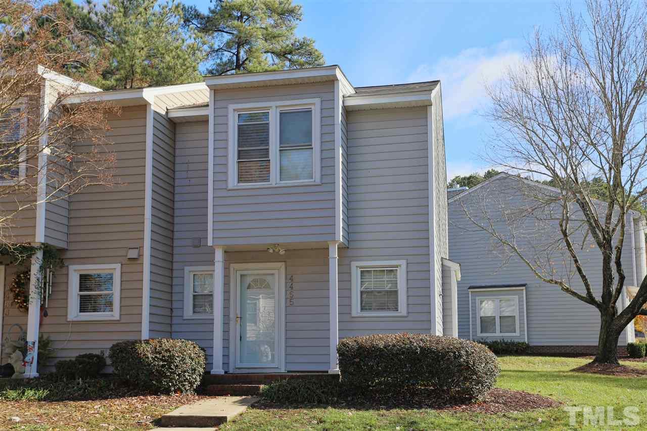 4465 Roller Court Raleigh, NC 27604 - Photo 23 of 23 a front view of a house with a yard