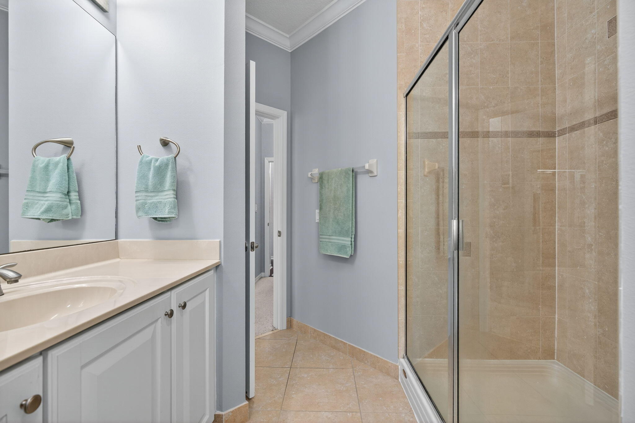 141 Seagrape Drive, Unit 203 Jupiter, FL 33458 - Photo 21 of 39 a bathroom with a shower and a sink