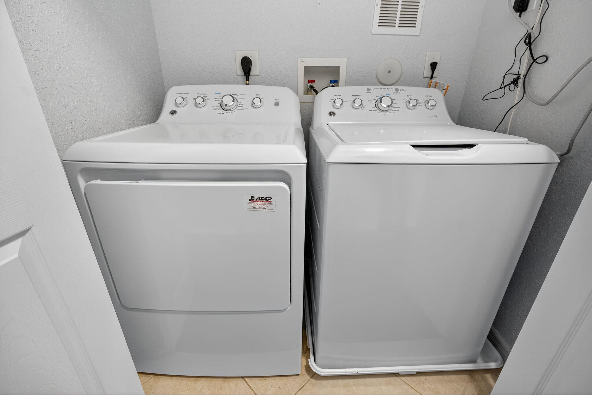 141 Seagrape Drive, Unit 203 Jupiter, FL 33458 - Photo 26 of 39 a utility room with dryer and washer