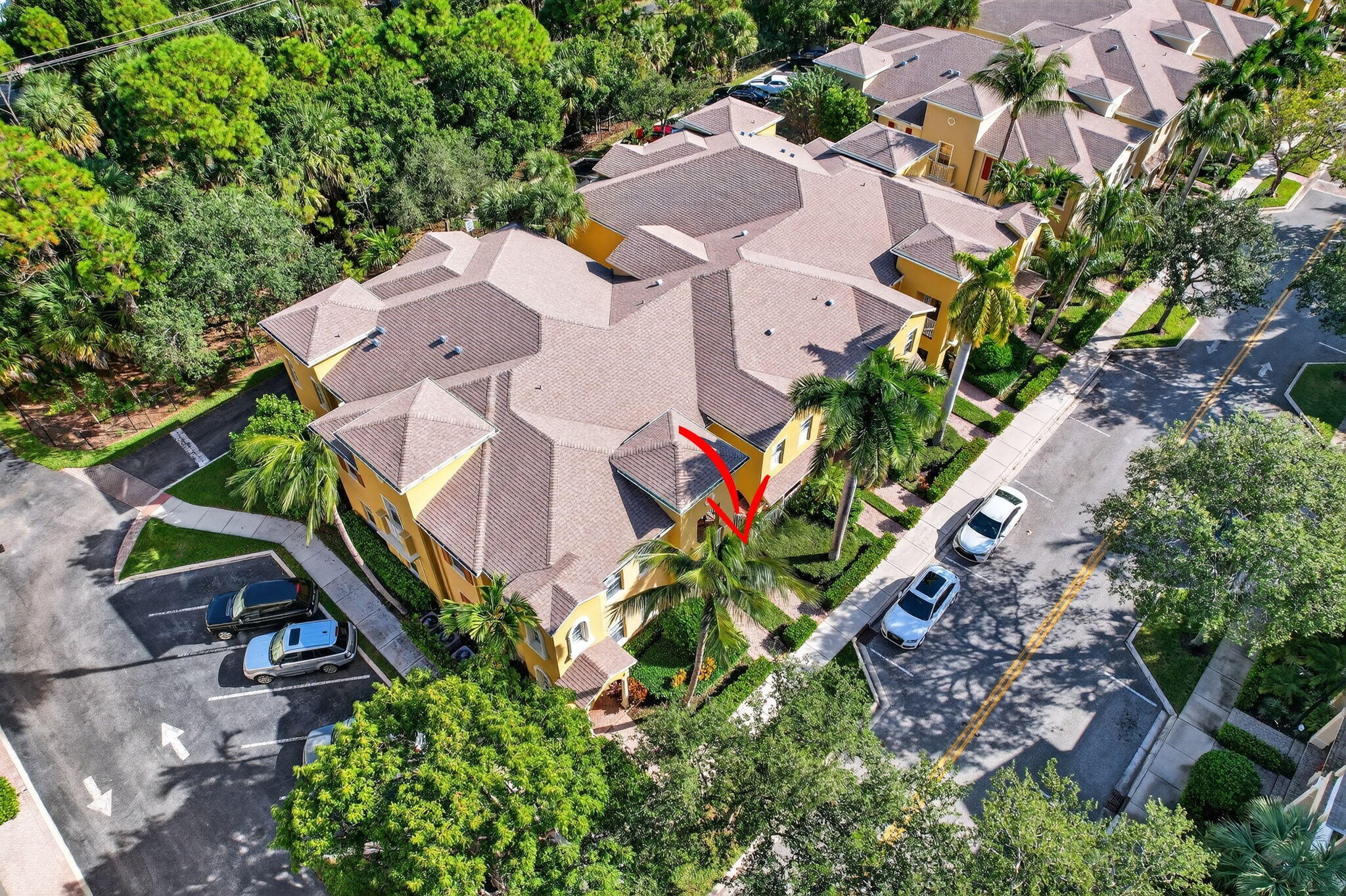 141 Seagrape Drive, Unit 203 Jupiter, FL 33458 - Photo 36 of 39 an aerial view of a house with a garden