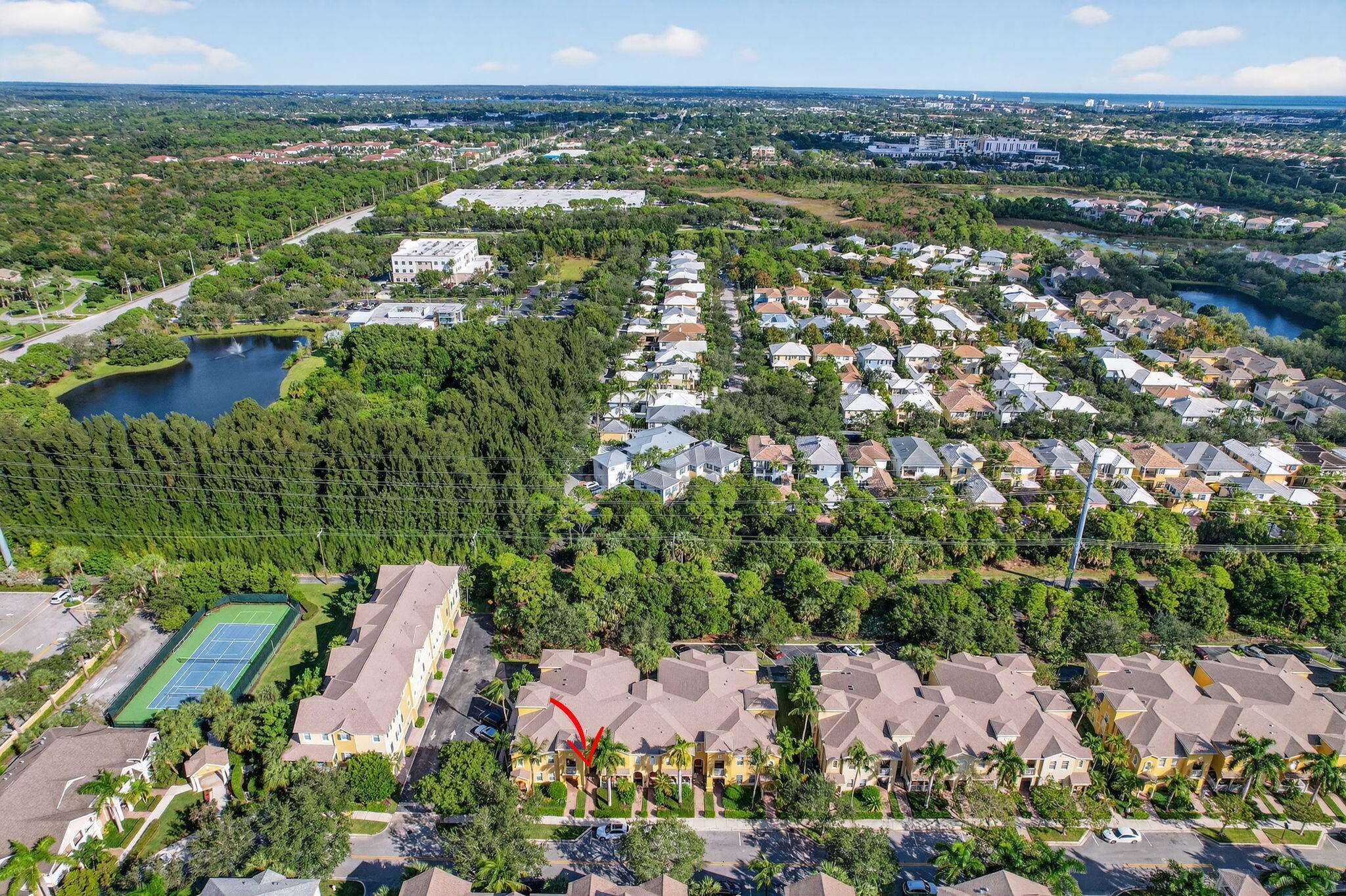 141 Seagrape Drive, Unit 203 Jupiter, FL 33458 - Photo 39 of 39 an aerial view of residential houses with outdoor space and river