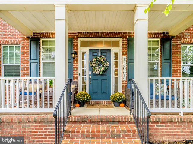 a front view of a house with a porch