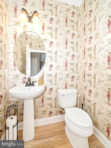 a bedroom with furniture and a baby crib