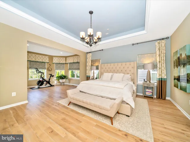 a bedroom with furniture and a couch