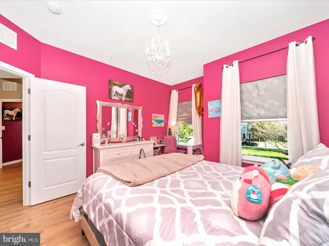 a view of a porch with furniture and garden