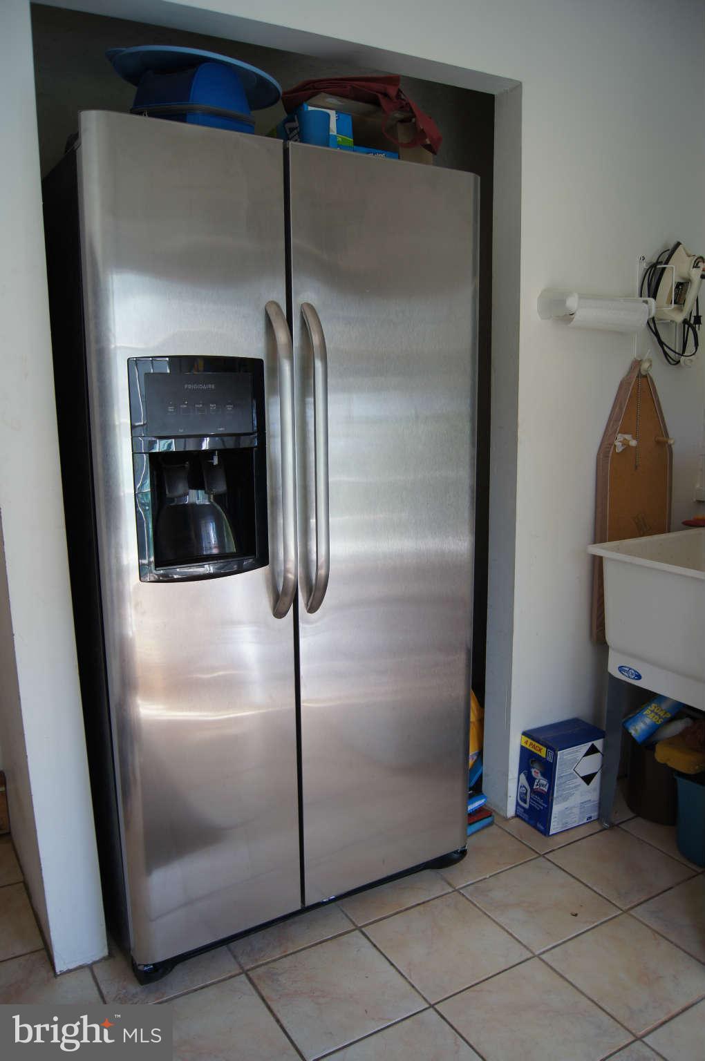 7106 Sheffield Road Baltimore, MD 21212 - Photo 14 of 30 Refrigerator in mud room or butler's pantry area