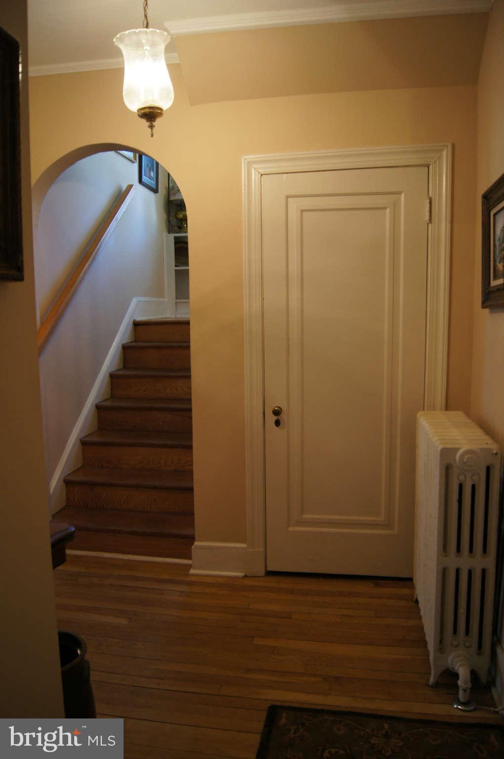 7106 Sheffield Road Baltimore, MD 21212 - Photo 7 of 30 Entry foyer with archway to staircase