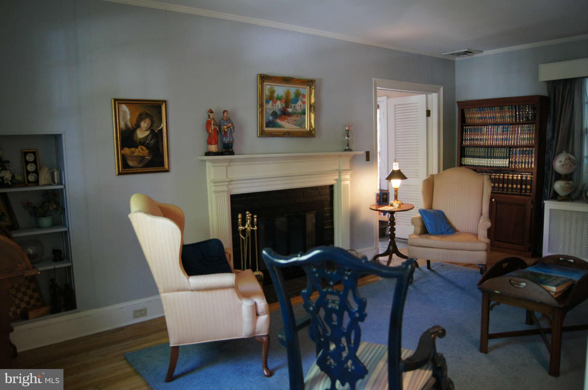 7106 Sheffield Road Baltimore, MD 21212 - Photo 8 of 30 Living Room with hardwood floors and fireplace
