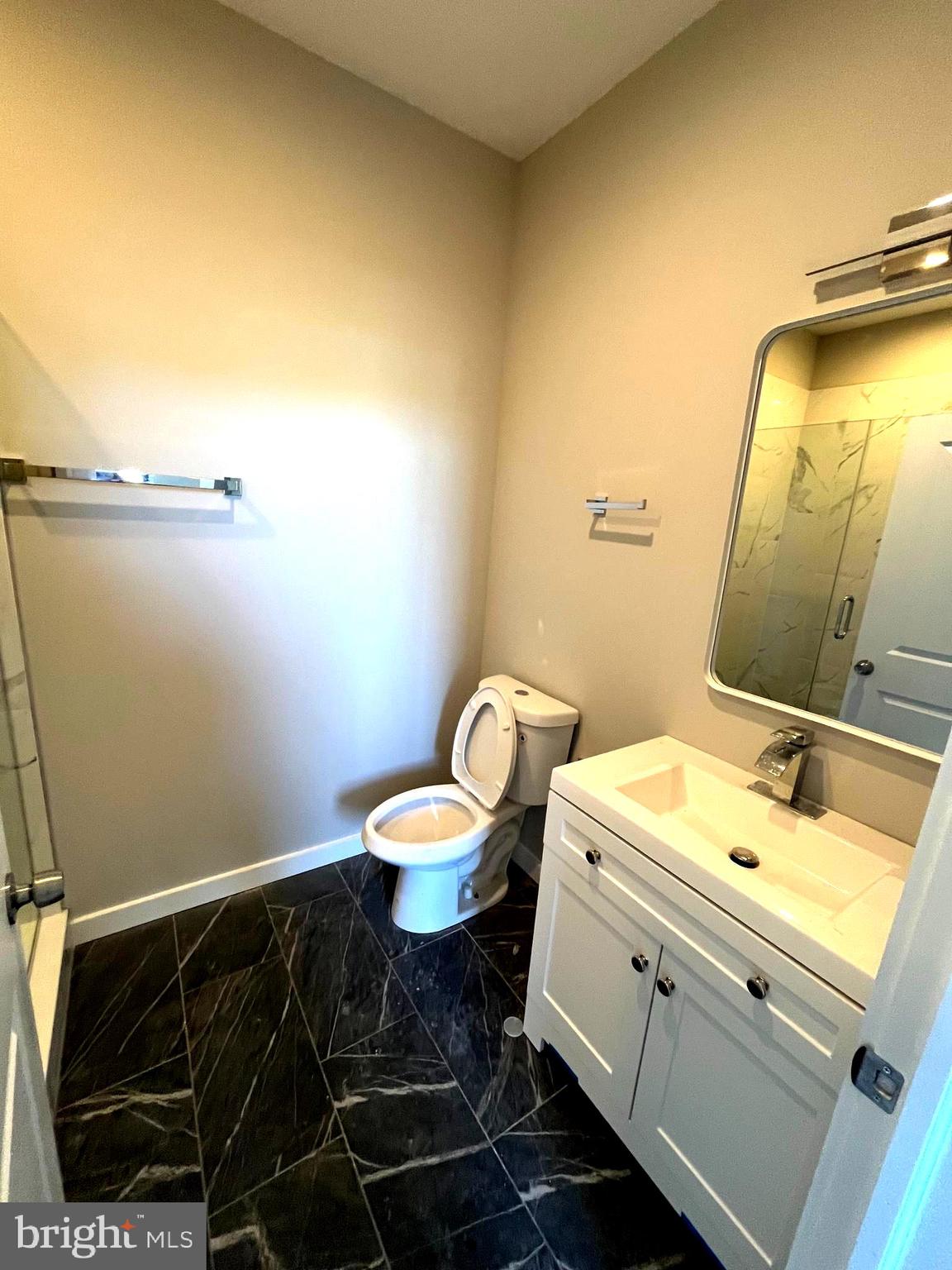 36 North Narberth Avenue, Unit 2C Narberth, PA 19072 - Photo 4 of 7 a bathroom with a sink and a toilet