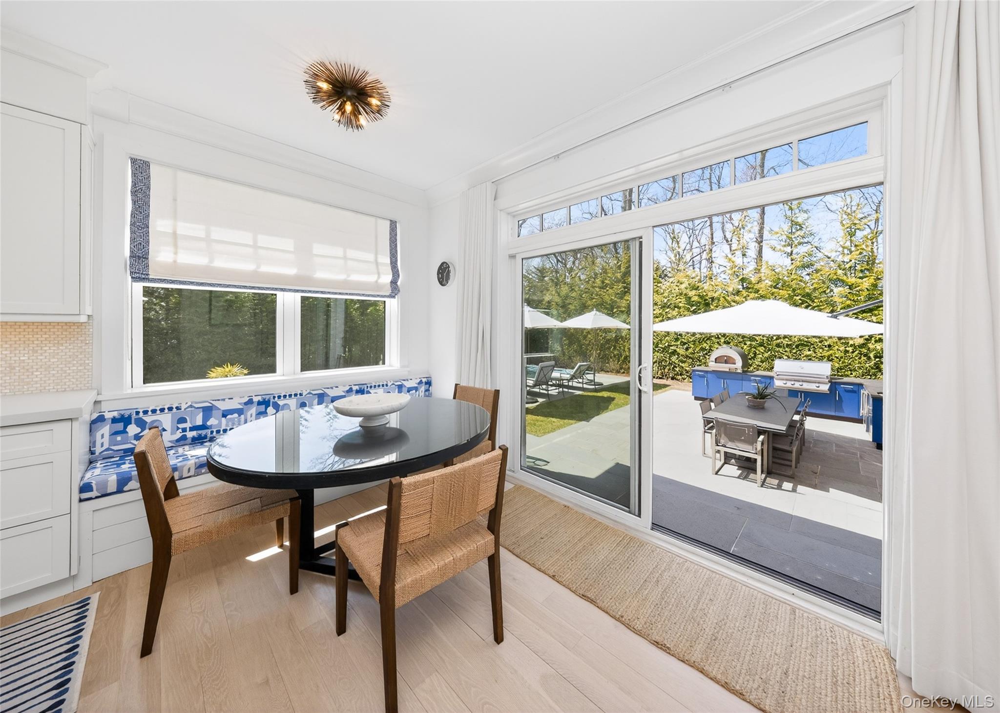 17 Bayview Road Southampton, NY 11968 - Photo 16 of 39 a view of a dining room with furniture window and outside view