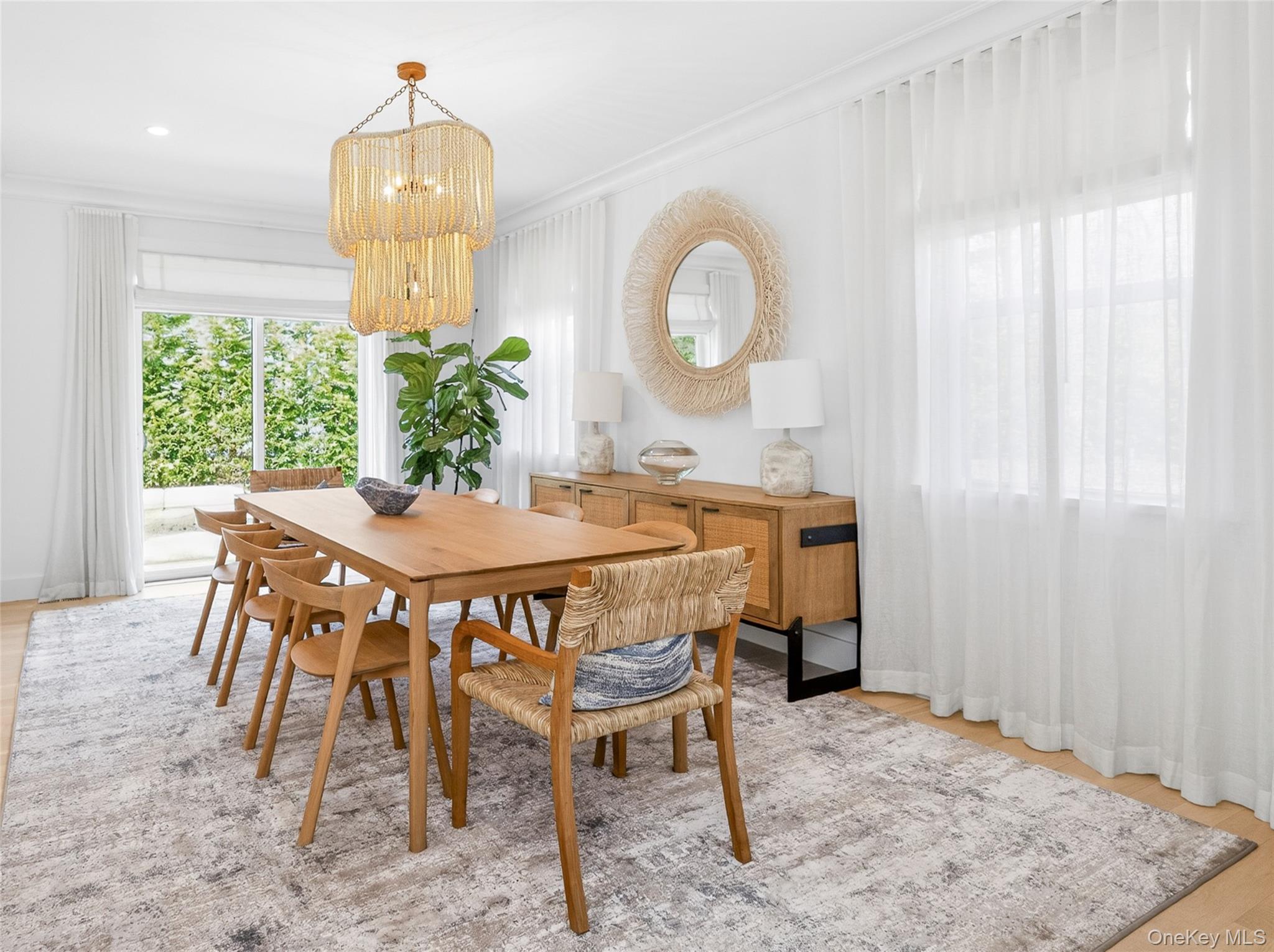 17 Bayview Road Southampton, NY 11968 - Photo 9 of 39 a view of a dining room with furniture window and outside view