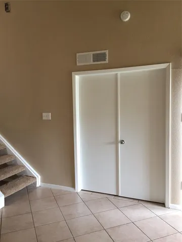a bathroom with a shower and a toilet