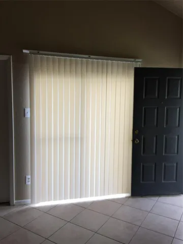 a living room with a fireplace