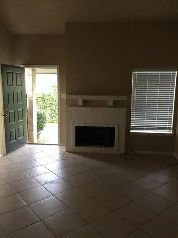 a view of cabinets and window