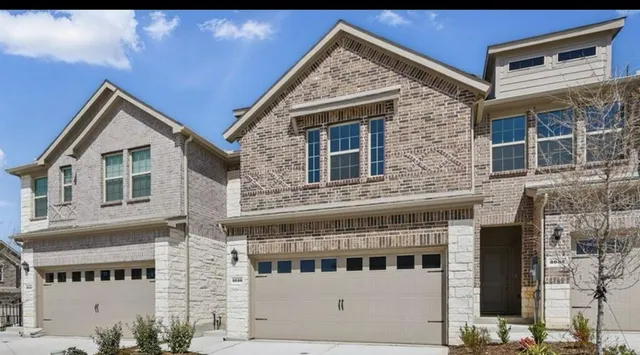 a front view of a house with windows