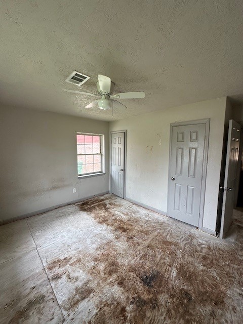 9122 Laura Koppe Road Houston, TX 77078 - Photo 9 of 9 an empty room with windows and entrance