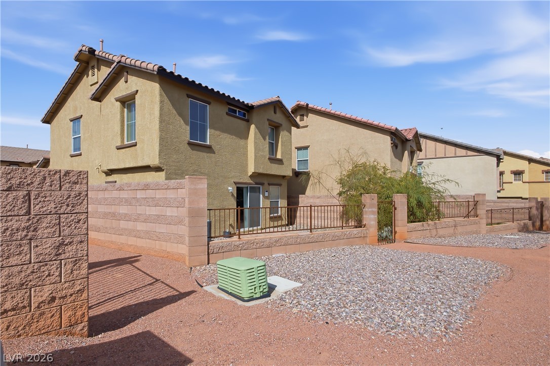 1172 Gecko Road Henderson, NV 89002 - Photo 23 of 30 Backyard is fenced and has a gate with access to walking trails