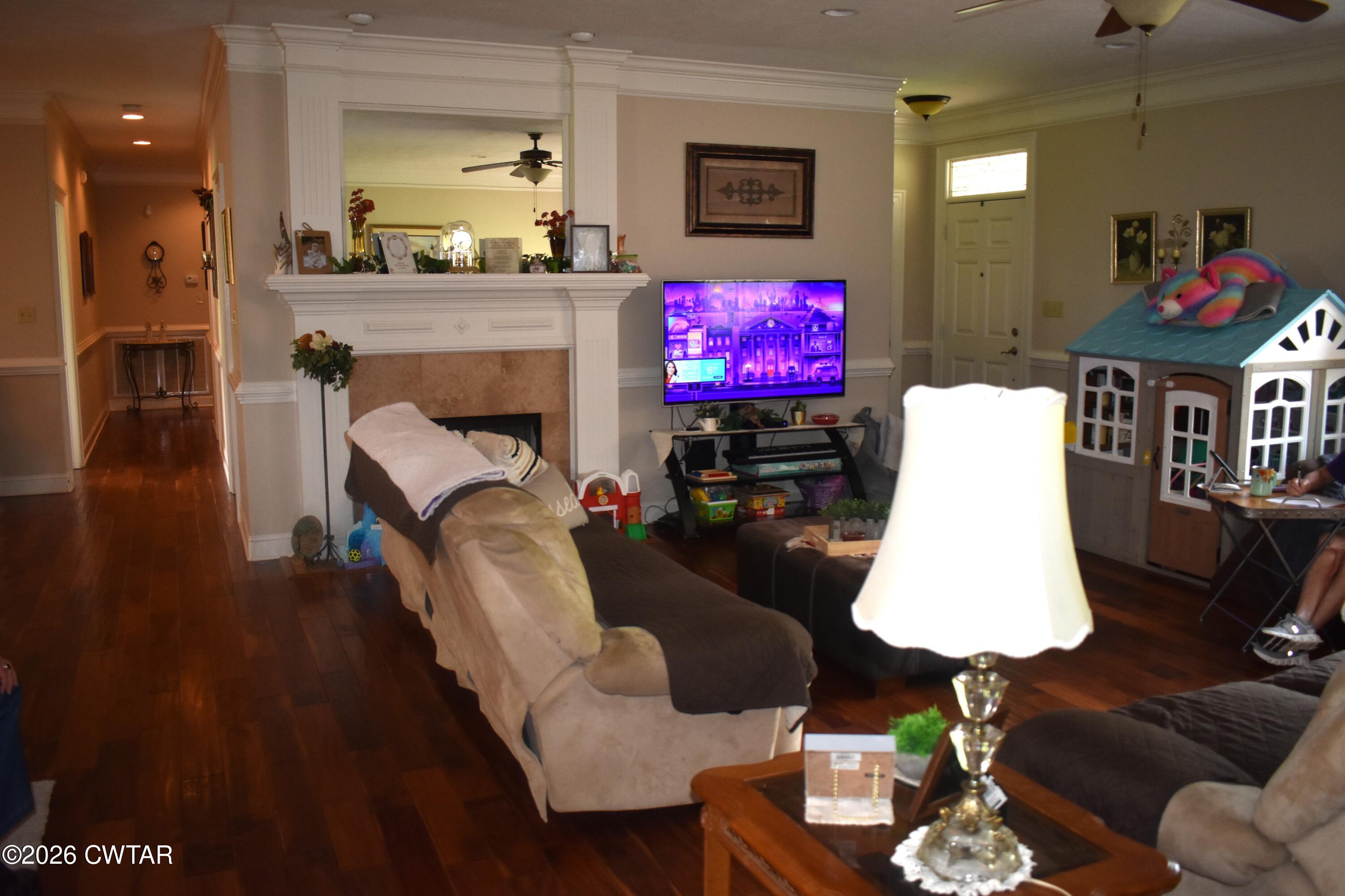 808 Tower Road McKenzie, TN 38201 - Photo 5 of 19 a living room with furniture and a flat screen tv