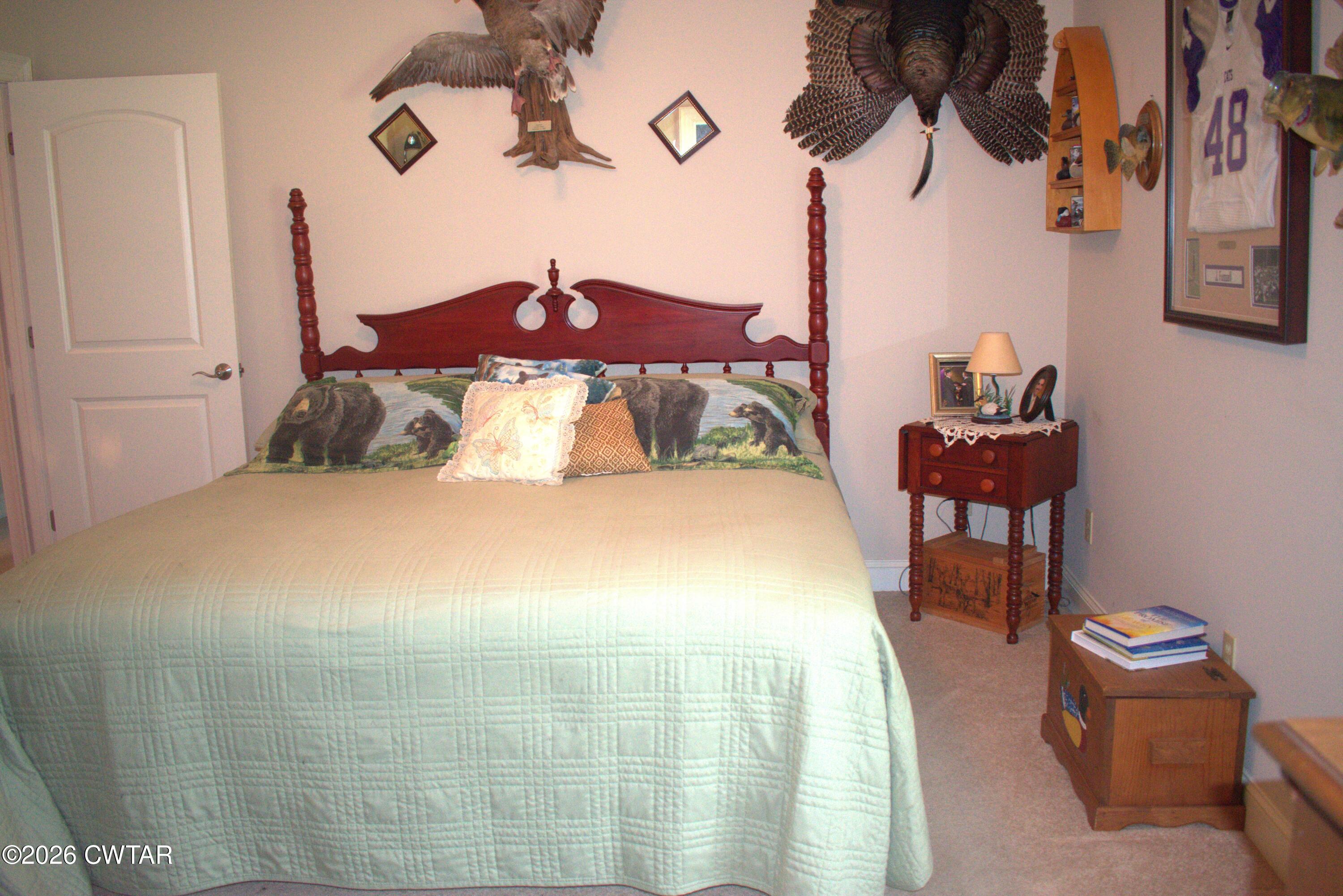 808 Tower Road McKenzie, TN 38201 - Photo 6 of 19 a bedroom with a bed and ceiling fan
