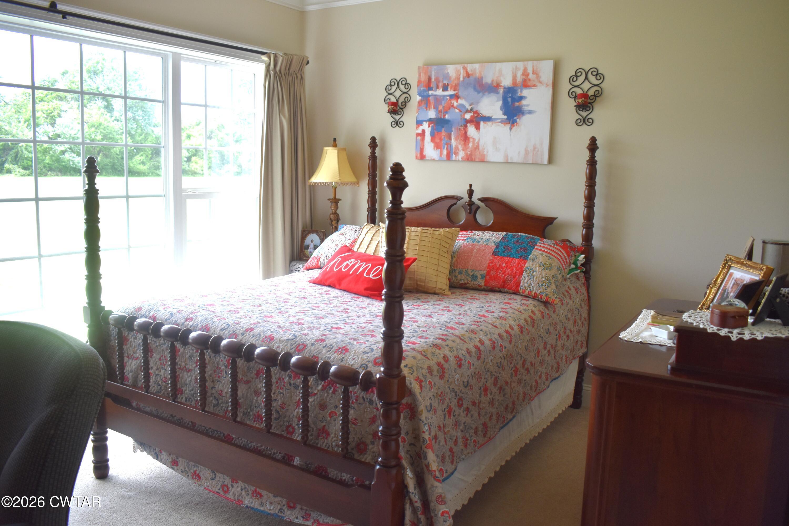 808 Tower Road McKenzie, TN 38201 - Photo 7 of 19 a bedroom with a bed and a window