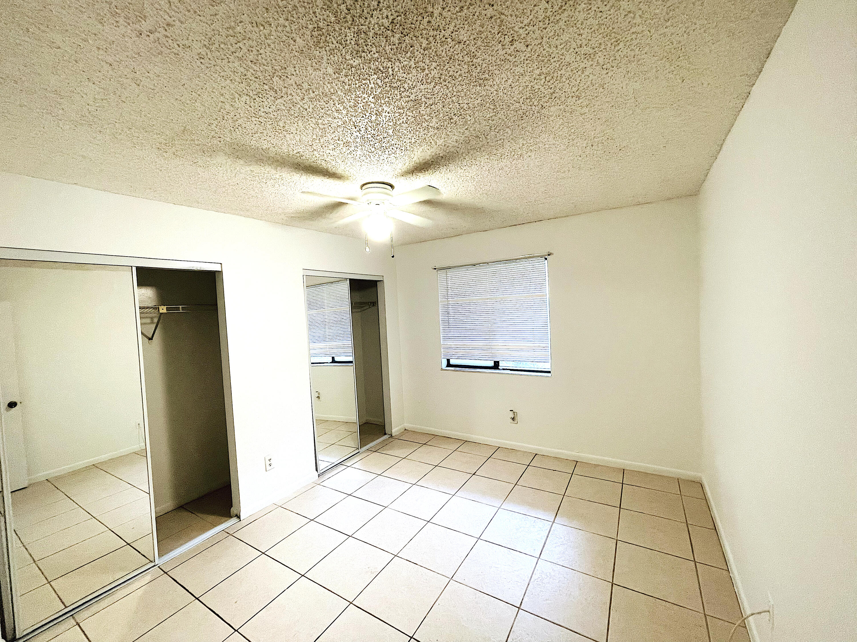 308 Hernando Street, Unit A Fort Pierce, FL 34949 - Photo 7 of 9 a view of an empty room