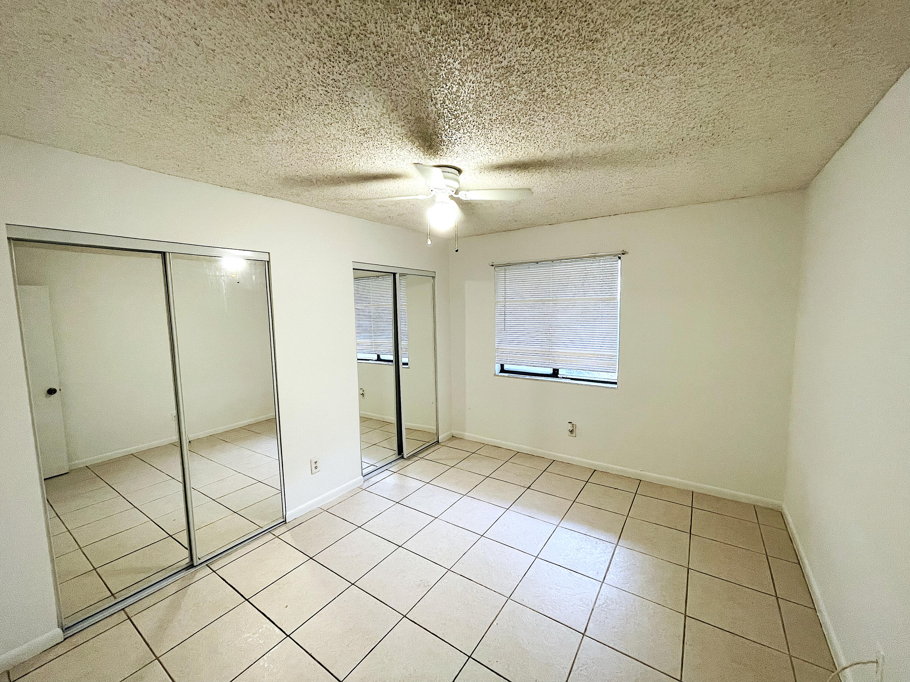308 Hernando Street, Unit A Fort Pierce, FL 34949 - Photo 8 of 9 a view of an empty room