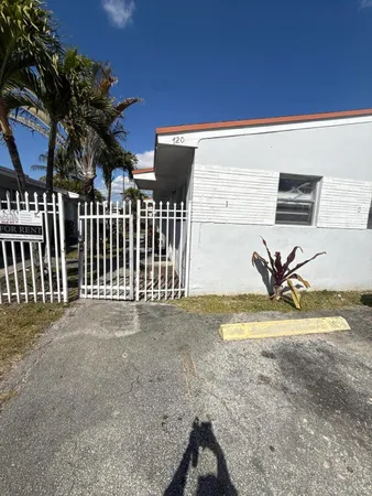 a view of multiple house with a yard