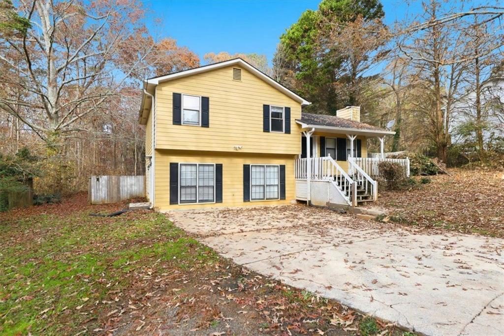 3307 Due West Road Dallas, GA 30157 - Photo 1 of 1 a front view of a house with a yard
