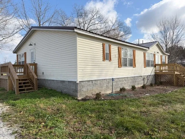 a view of a backyard with a garden