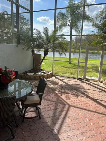 a view of hall way with furniture