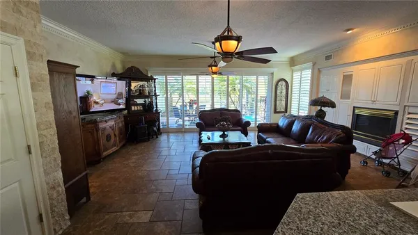 a view of a dining room with furniture and window