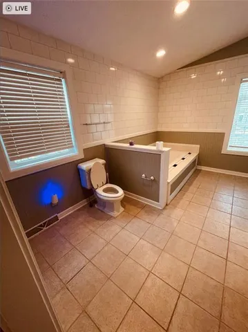 a living room with a table and a couch